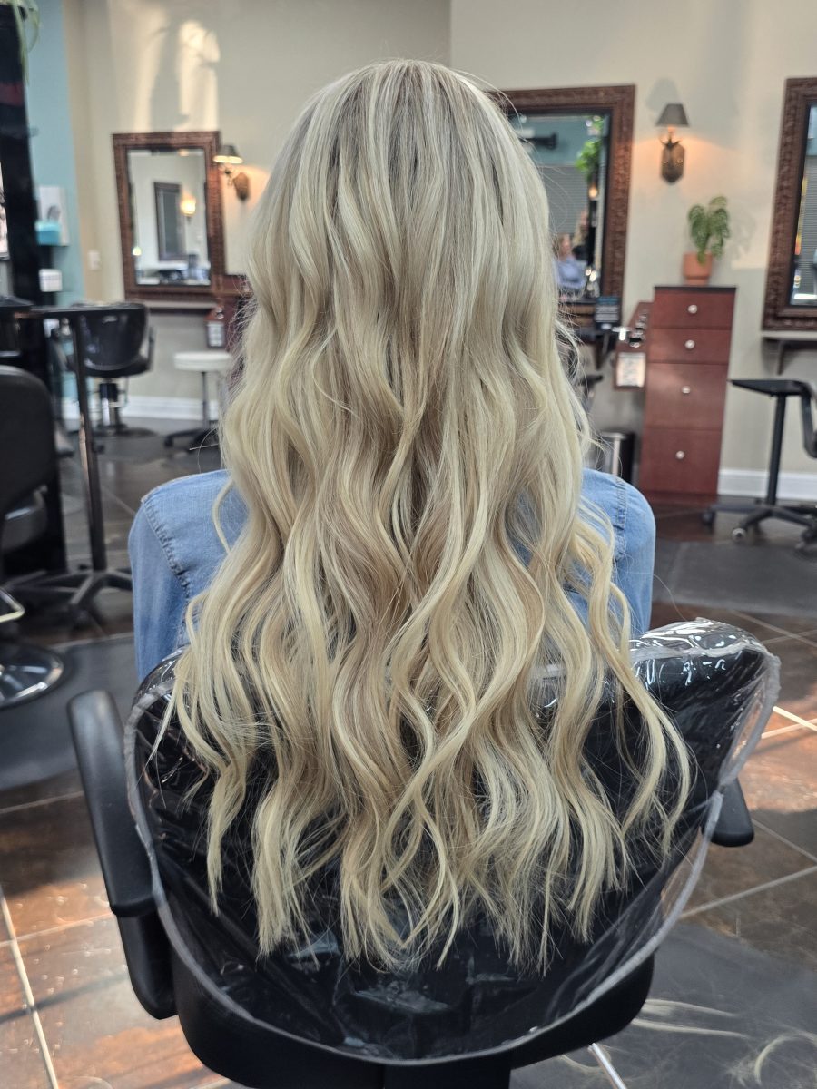 Dimensional highlights and lowlights with seamless extensions by Kristan Sayers at K Bella Hair Studio & Spa in Brighton, MI - after transformation