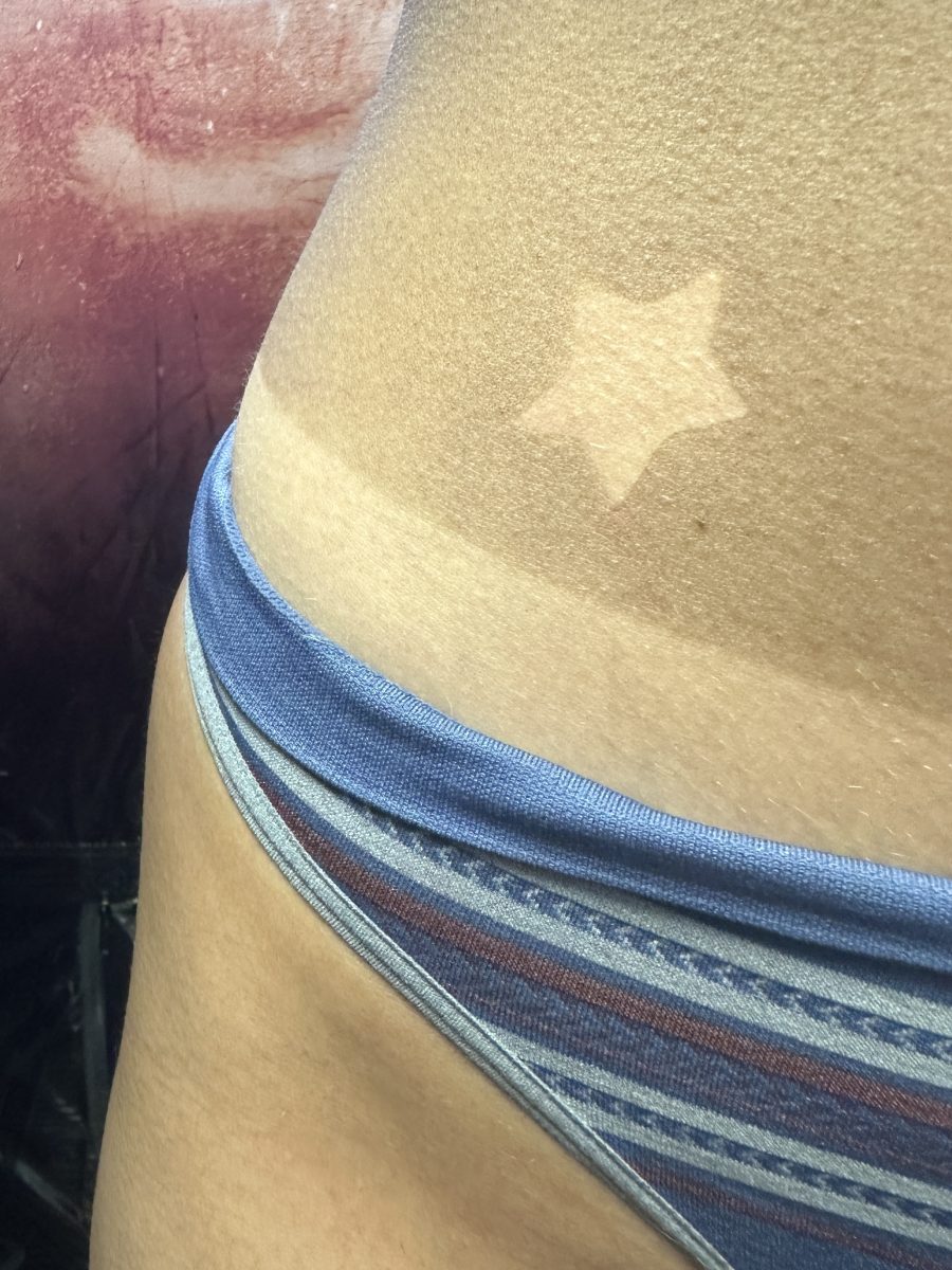 Custom airbrush spray tan results by Liberty Greenwood at K Bella Hair Studio & Spa in Brighton, MI - after transformation