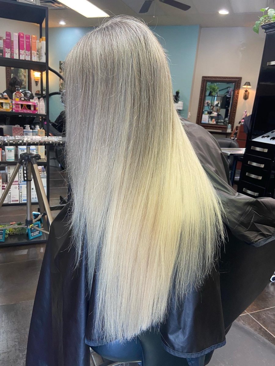Seamless hair extensions adding length and volume by Kameryn Bell at K Bella Hair Studio in Brighton, MI - after transformation