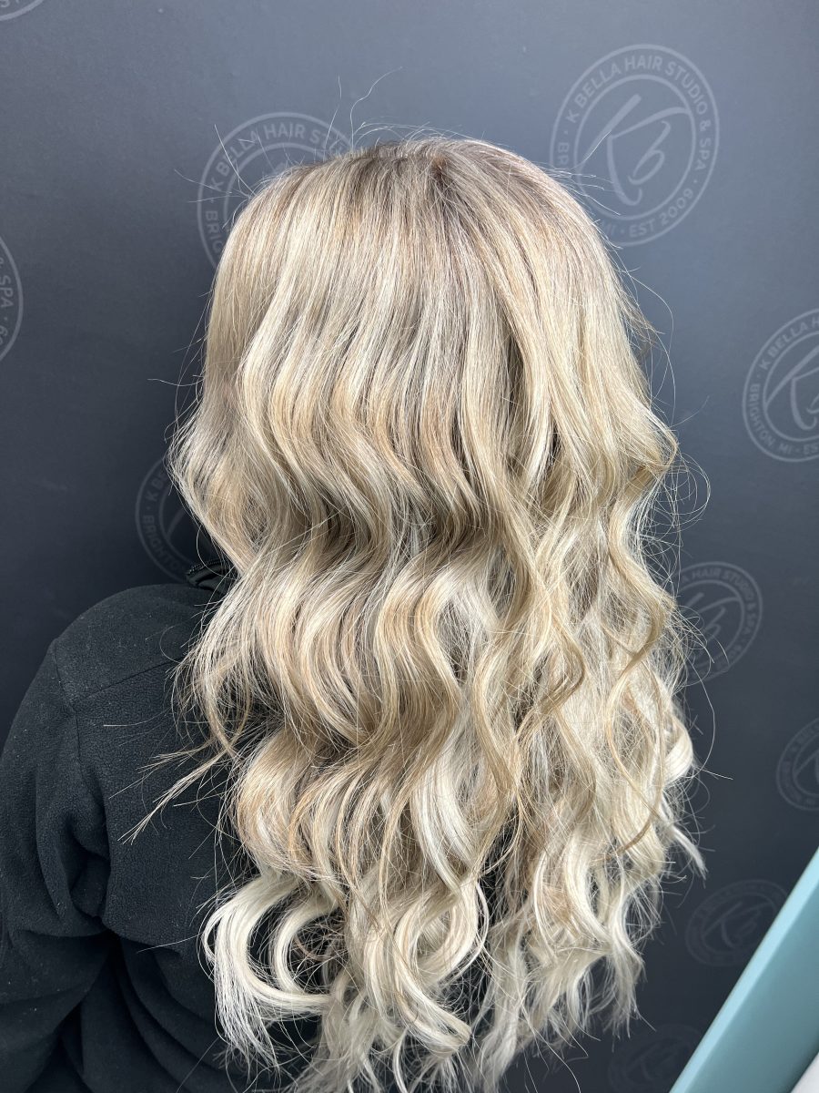 Seamless hair extensions adding length and volume by Raelynn Haan at K Bella Hair Studio in Brighton, MI - after transformation