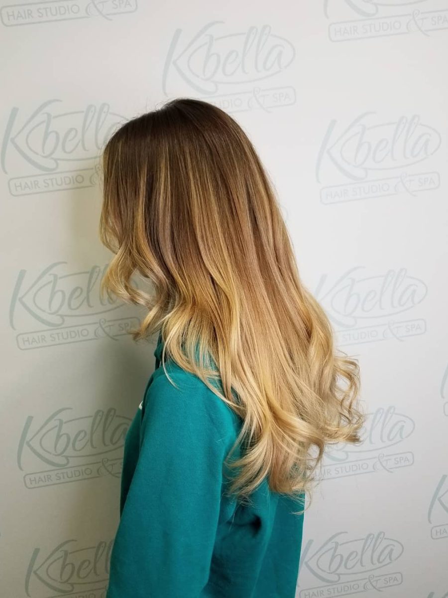 Sun-kissed balayage highlights by Kristan Sayers at K Bella Hair Studio in Brighton, MI