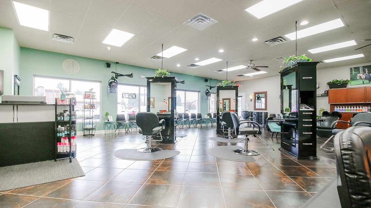 Main floor of the K Bella salon in Brighton with stylist chairs and mirrors