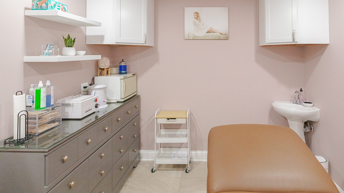 Treatment bed and equipment in a K Bella spa service room